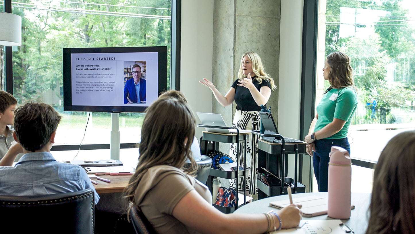 Two teachers instructing a life skills workshop